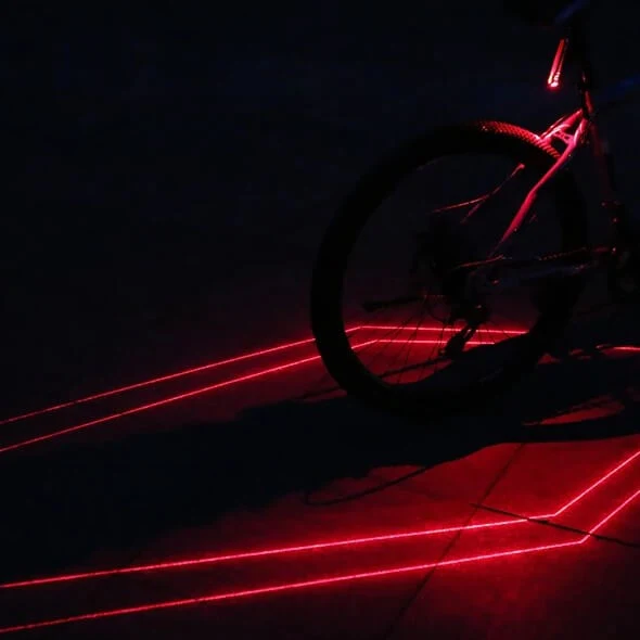 LaserSpotlight™ | Feu arriere velo avec laser pour sécurité nocturne optimale