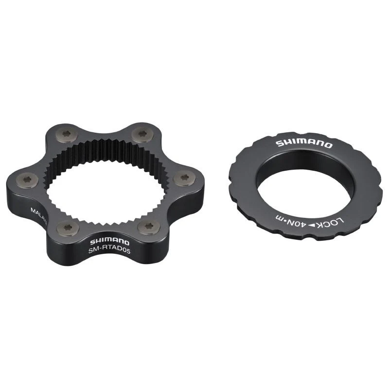 ADAPTATEUR FREIN A DISQUE TRANSFORME FIXATION DISQUE CENTERLOCK SHIMANO EN 6 TROUS POUR AXE TRAVERSANT (ORIGINE)