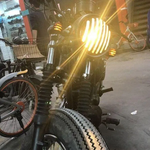 Phare rond moto avec grille