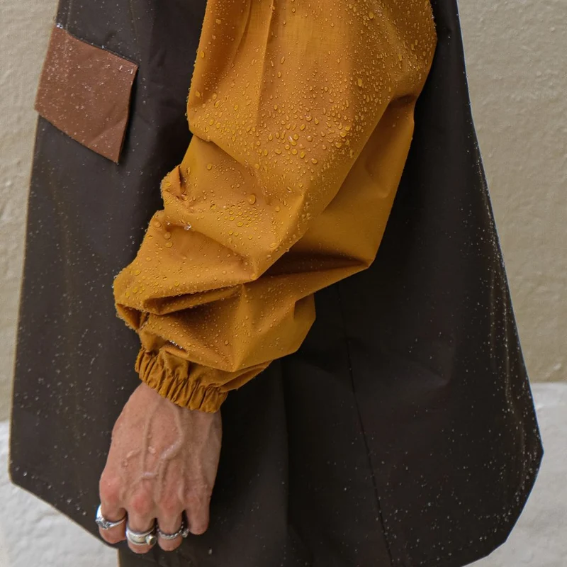 Poncho de pluie court Poule Party adulte Kaki