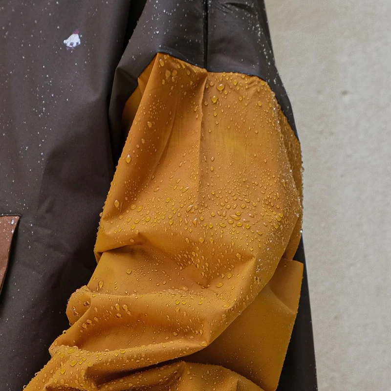 Poncho de pluie court Poule Party adulte Kaki