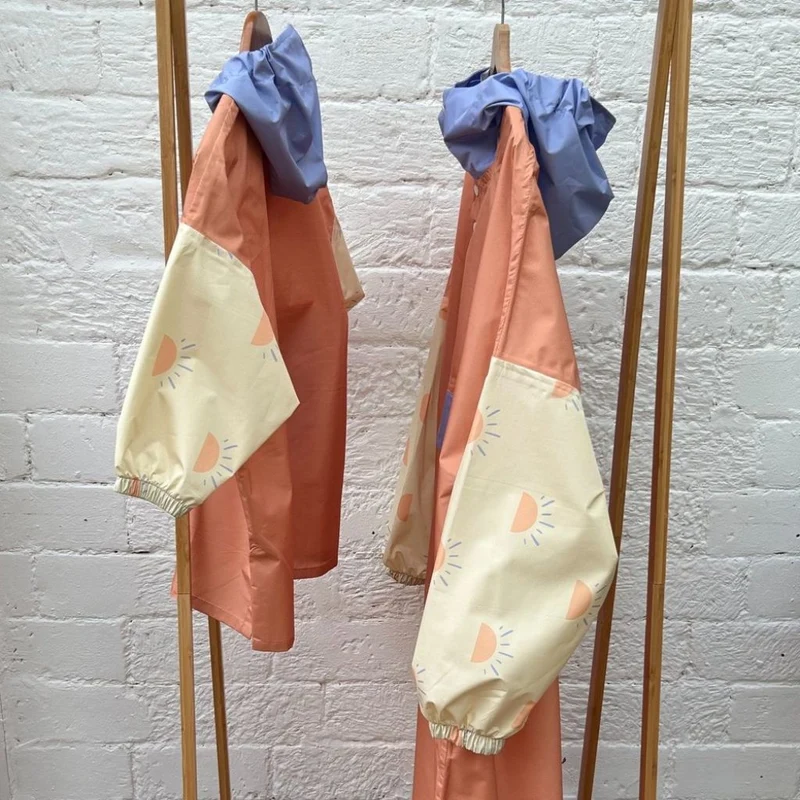 Poncho de pluie Poule Party adulte ou enfant Sunrise