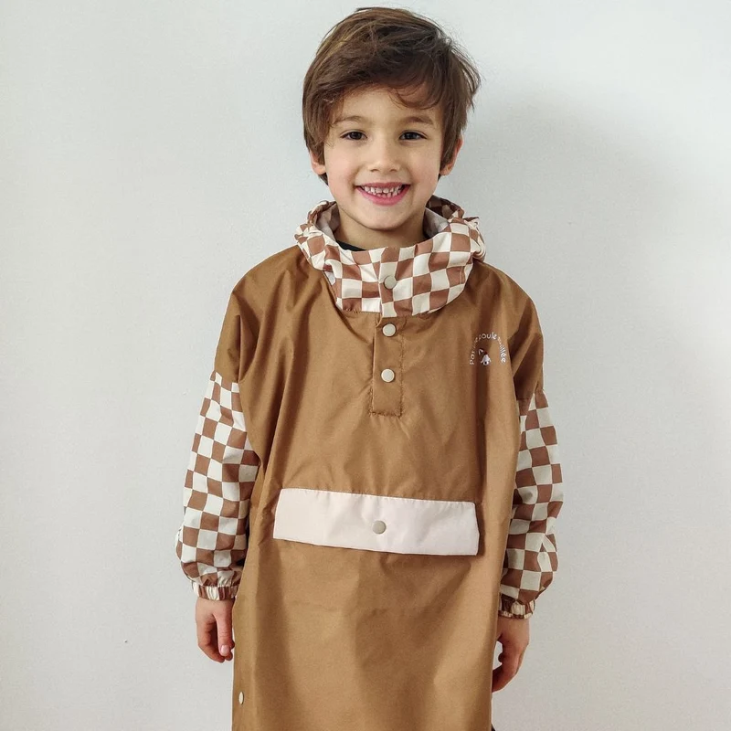 Poncho de pluie Poule Party adulte ou enfant damiers